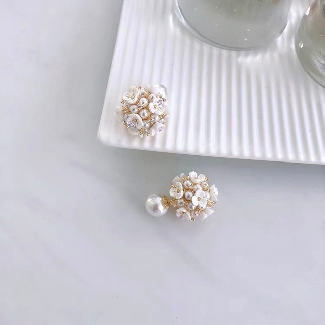 Shell pearl flower pierce
