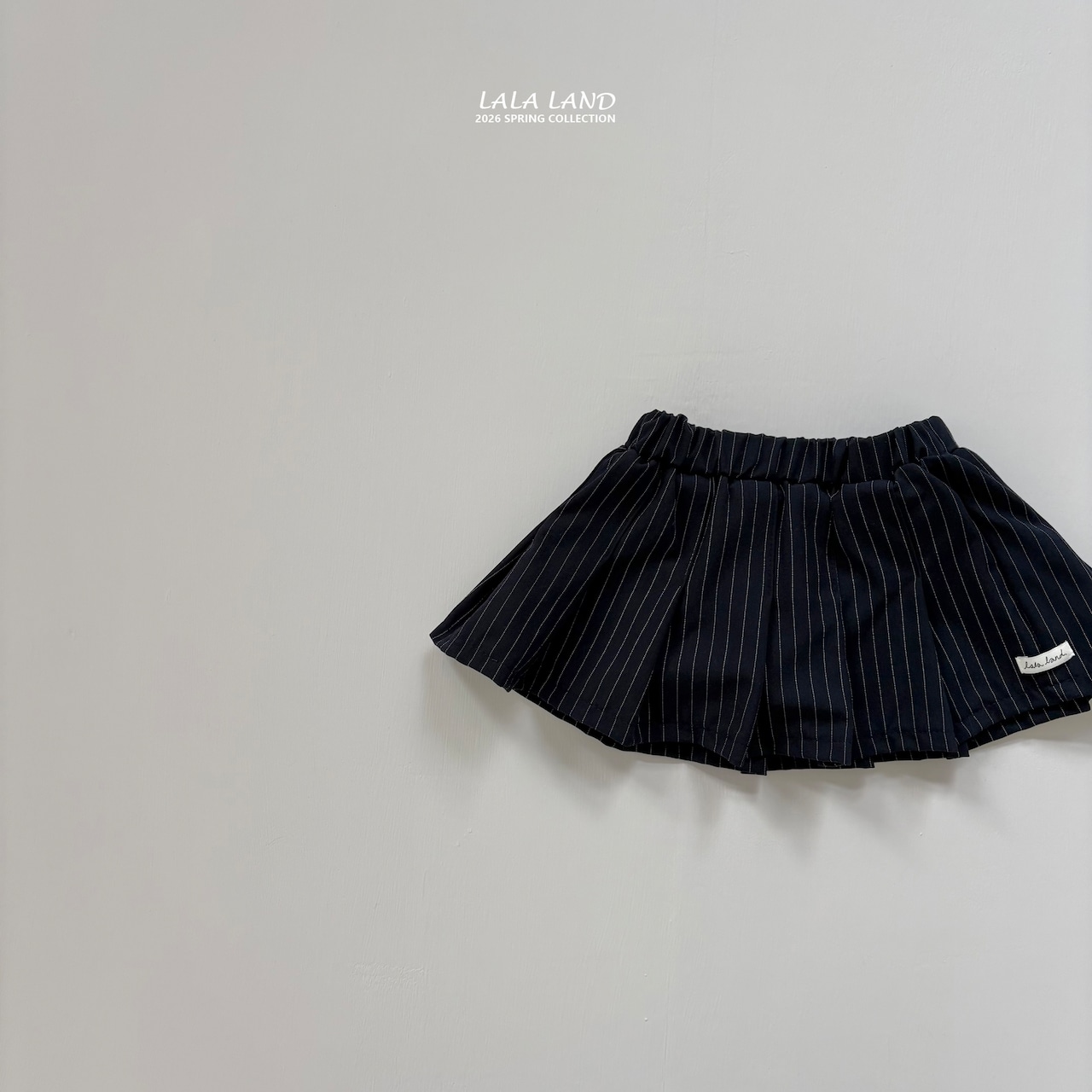 LALALAND 26/SS (Kids)Seamed pleated skirt