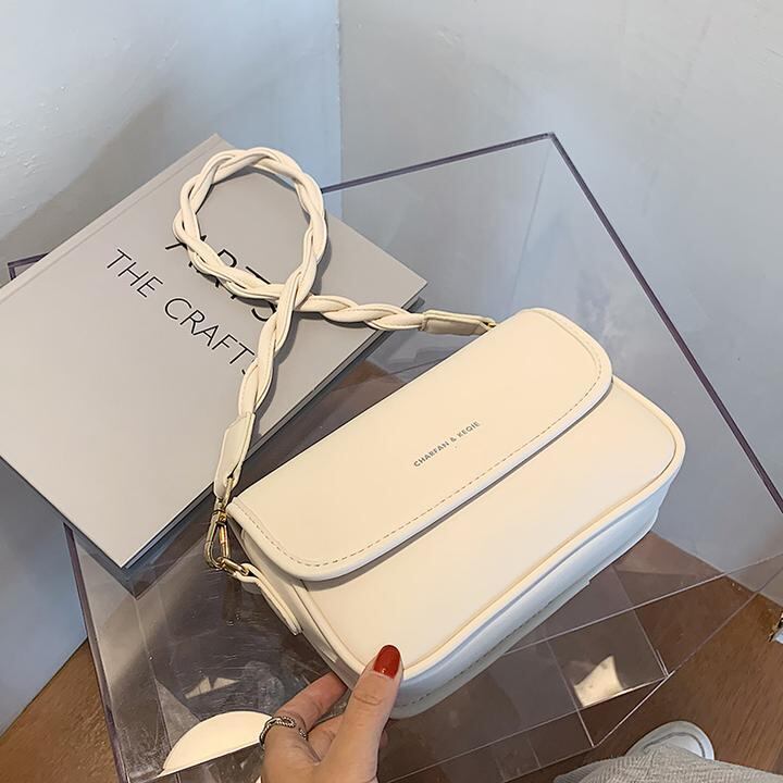 白いバッグ女性2020新しい波夏のファッションシンプルなシングルショルダーメッセンジャーバッグネットレッドワイルド手織りバッグ Tiancai_Wing_Bag2056302