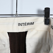 INTERIM / INDIA WOOL CLASSIC HERRINGBONE WITH LEATHER PIPING 2-TUCK STRAIGHT SLACKS