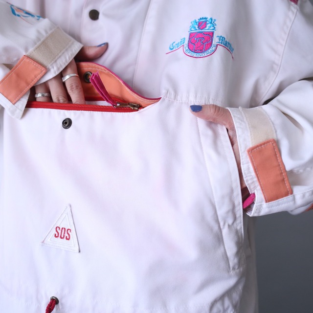 "SOS" cute coloring switch and embroidery design over silhouette anorak parka
