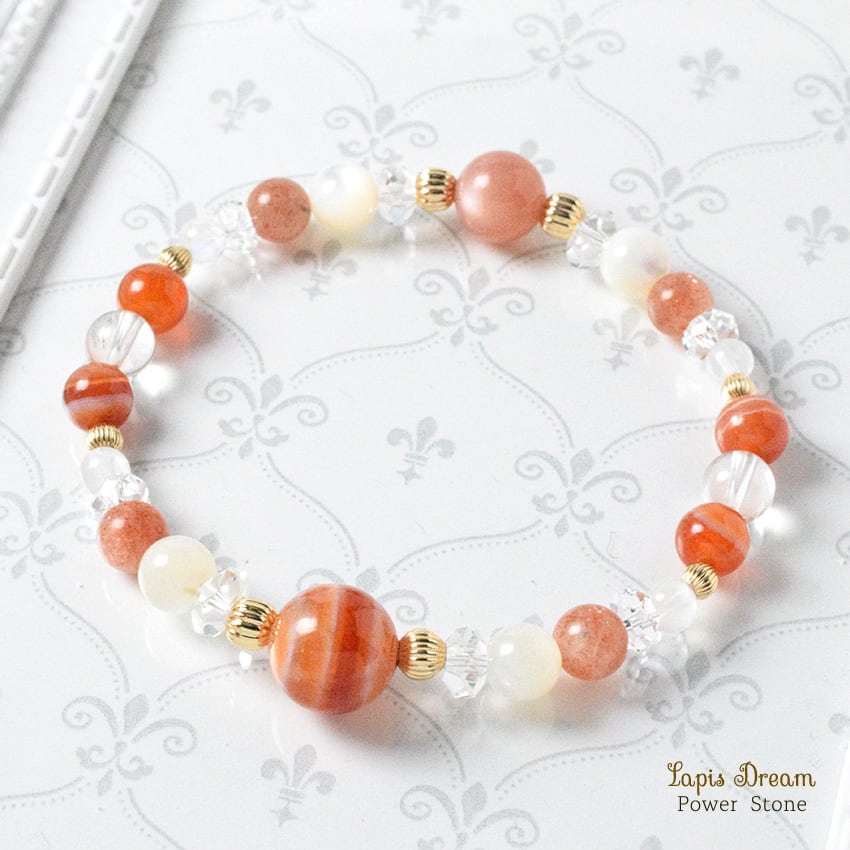 心にやさしい勇気を灯す幸運のお守り | サーニクス、オレンジムーンストンのパワーストーン ブレスレット
