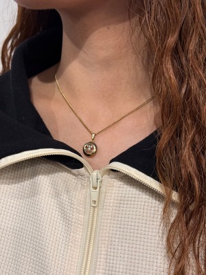 courrèges/ vintage gold circle logo necklace.