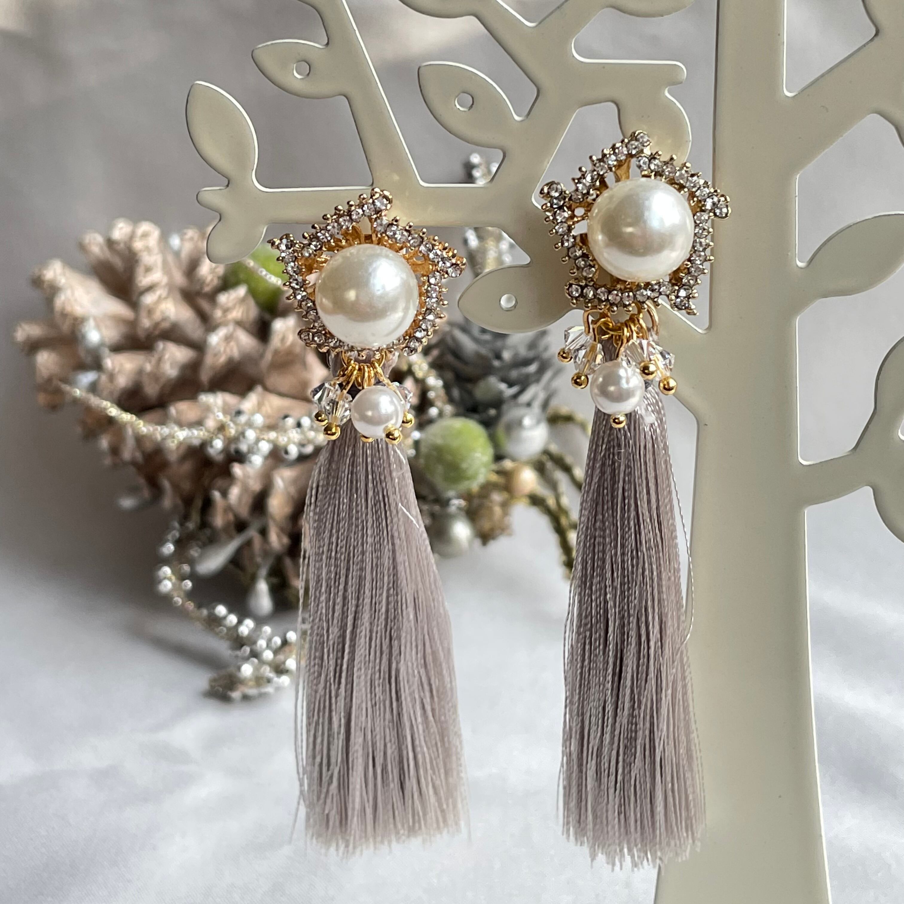 大粒パールのスターカボションとロングタッセルのピアス・イヤリング