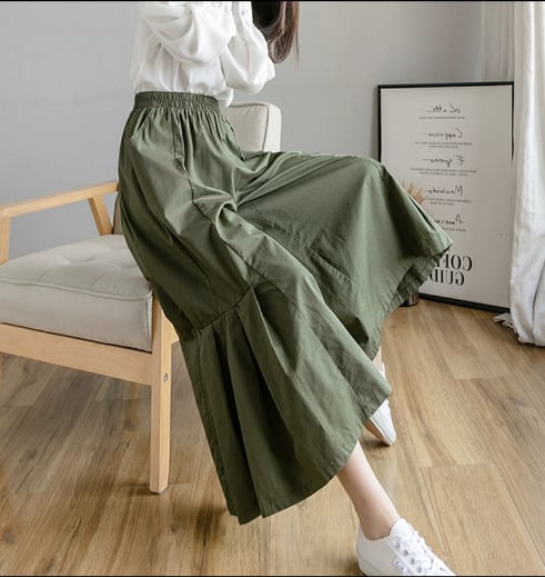 ボトムス パンツ ワイドパンツ ガウチョパンツ クロップドパンツ ロング丈 Aライン アシンメトリー 切り替えデザイン プリーツ ポケット ウエストゴム かわいい きれいめ シンプル カジュアル おしゃれ かっこいい 大人可愛い 大人女子 ラフ キュート ガーリー ルーズ 個性的 存在感 抜け感 無地 10代 20代 30代 レディース 女性用 学生 通学 デート お出かけ 公園 女子会 休日 旅行 着回し 普段使い 楽ちん 体系カバー S M L XL 色展開 黒 ブラック 緑 グリーン カーキ 紺