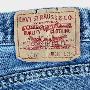 【LEVI'S】550 ジーンズ デニム ジーパン ワイドテーパード ジッパーフライ W36 L34 リーバイス ルーズ ダボパン ダメージ ジーンズ RELAXED FIT レソト製 US古着