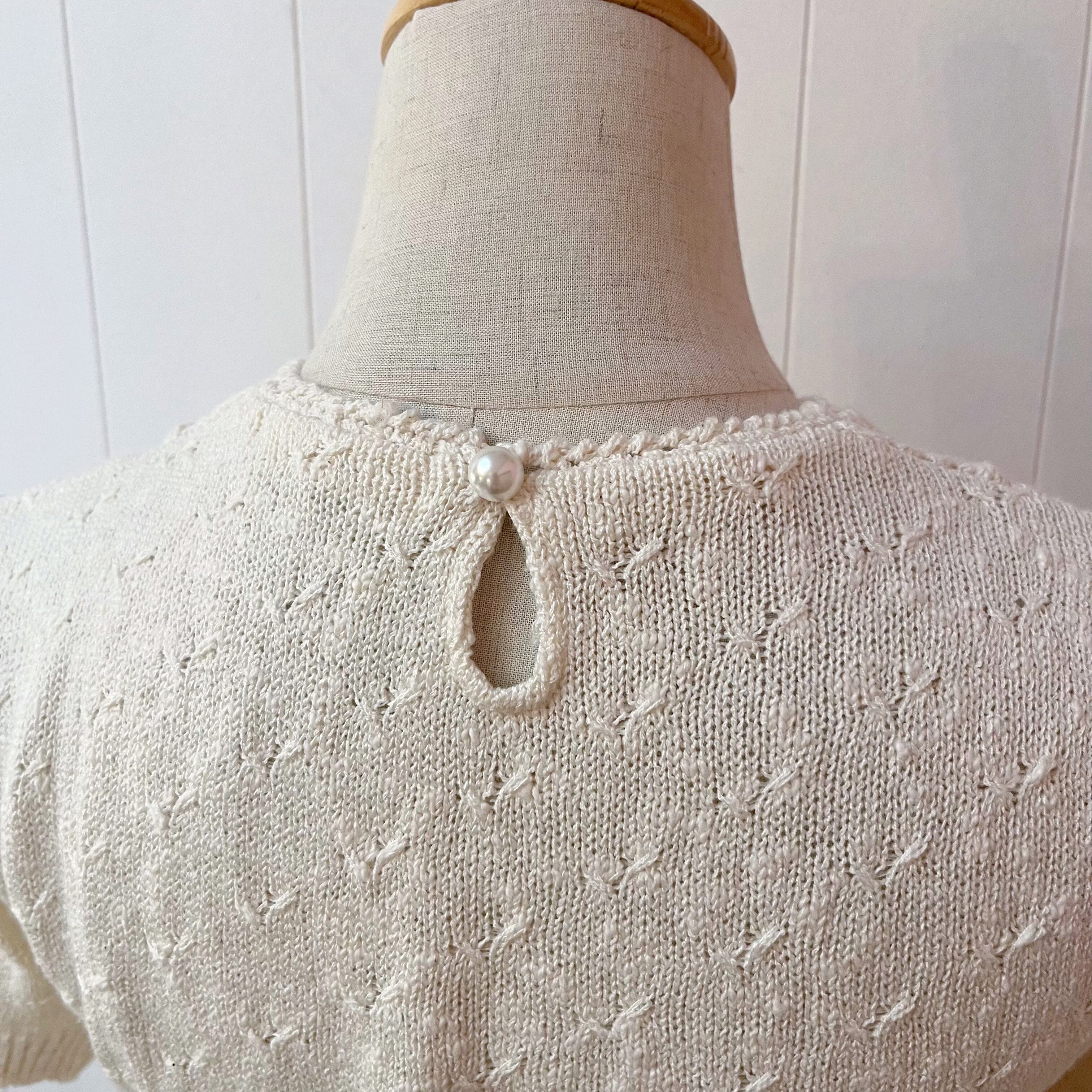 ribbon brooch off white knit po