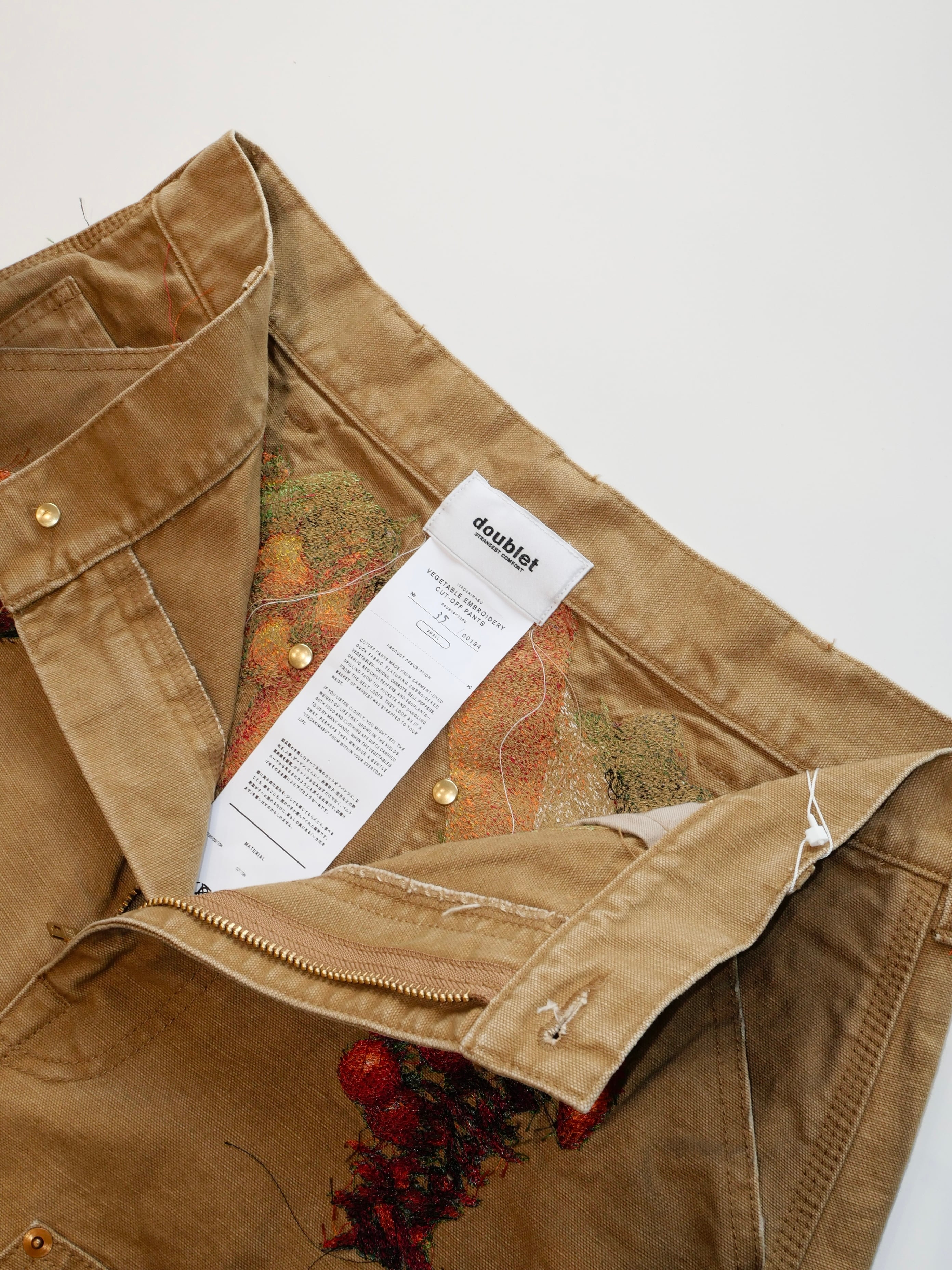 doublet VEGETABLE EMBROIDERY CUT-OFF PANTS | CONSTRUCT1