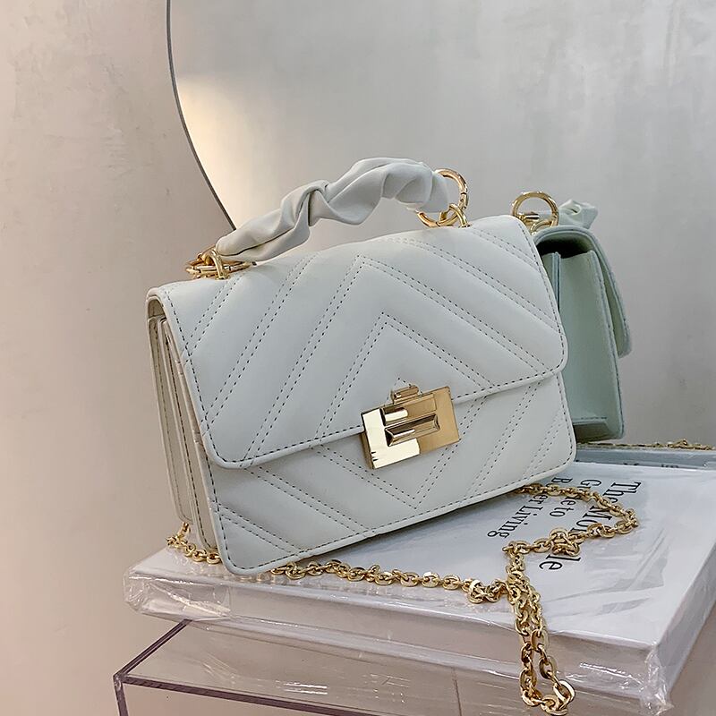 白いバッグ女性2020新しい波夏のファッションチェーンポータブルクロスボディバッグネット赤野生の肩小さな正方形のバッグ Tiancai_Wing_Bag5244768