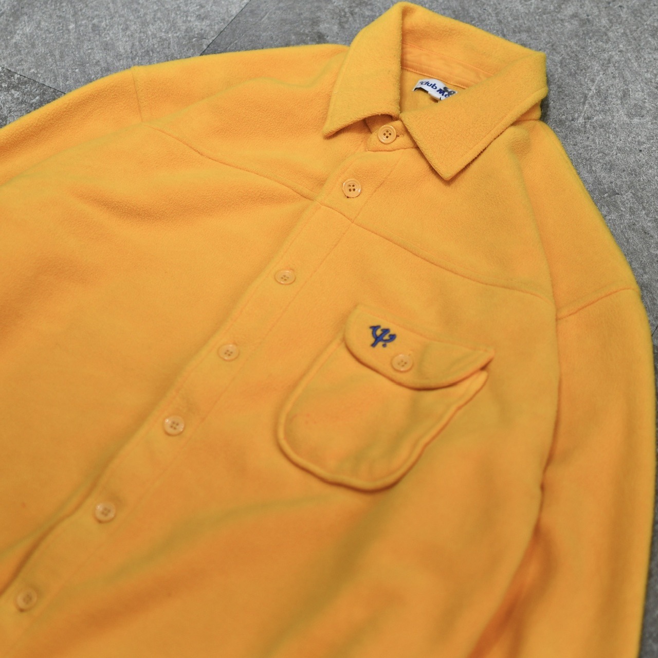 yellow fleece shirt