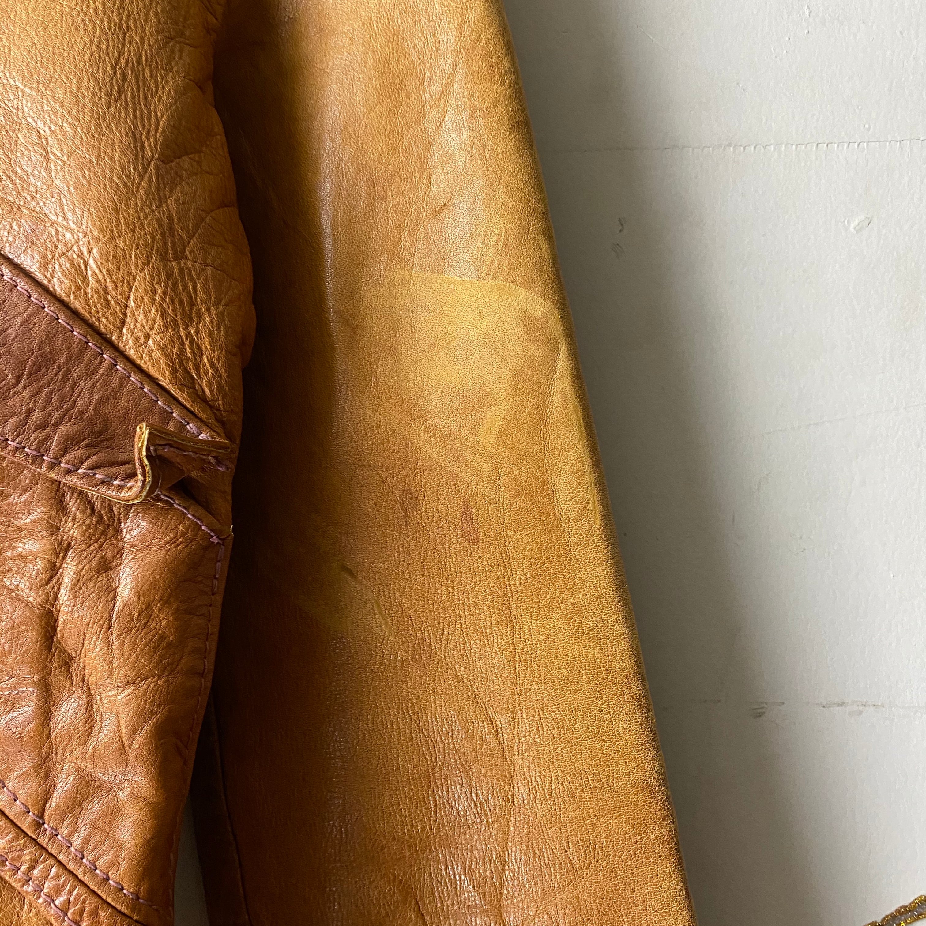 vintage 1970's EAST WEST MUSICAL INSTRUMENTS leather jacket