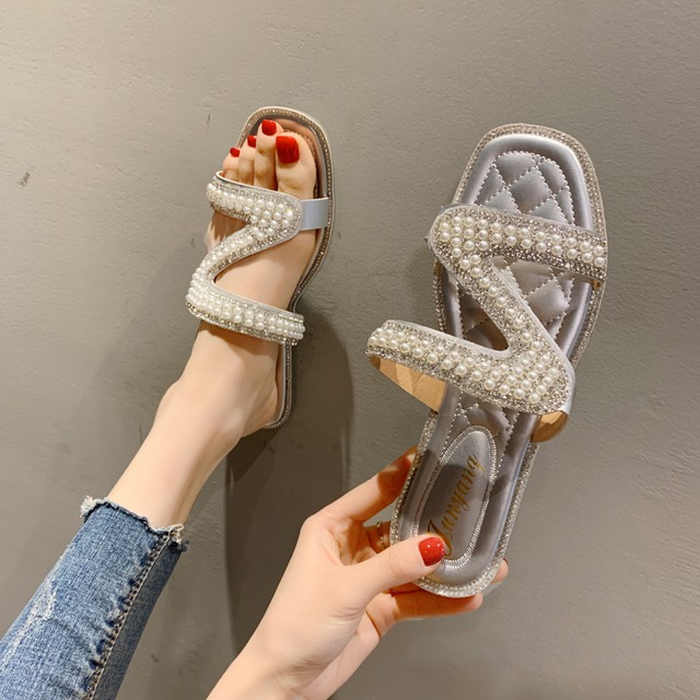 スリッパ女性はファッション2020春と夏の新しい野生の単語のドラッグ女性のインラインストーンパールビーチサンダルドラッグを着用します 部族の婦人靴4079066