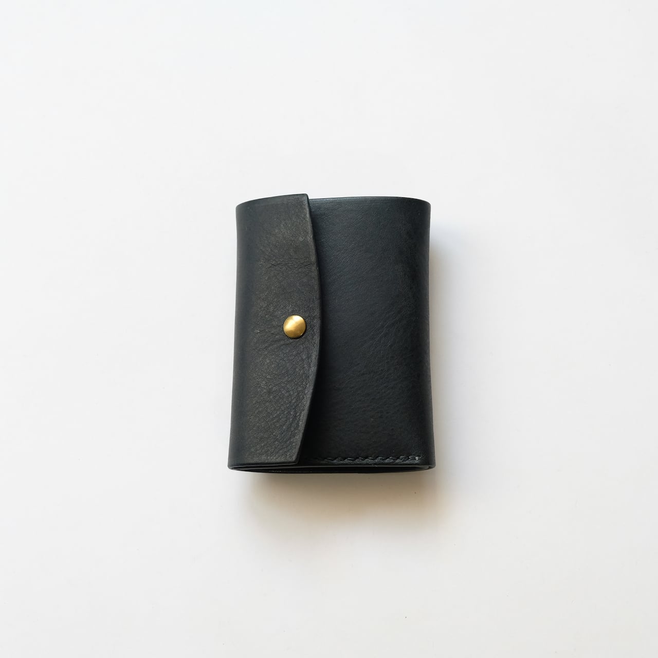 tri-fold wallet - bk - unknown vacchetta