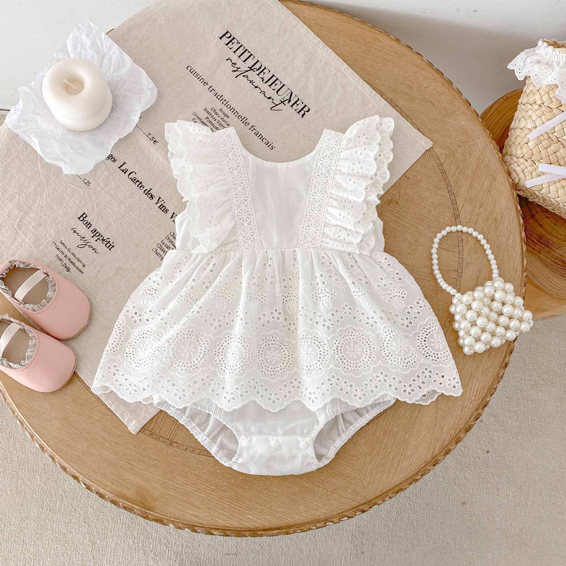 バックリボンオープンロンパース