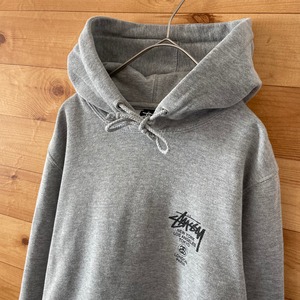 【STUSSY】USA製 WORLDTOUR スウェット プルオーバー パーカー ワンポイント バックプリント アメリカ古着