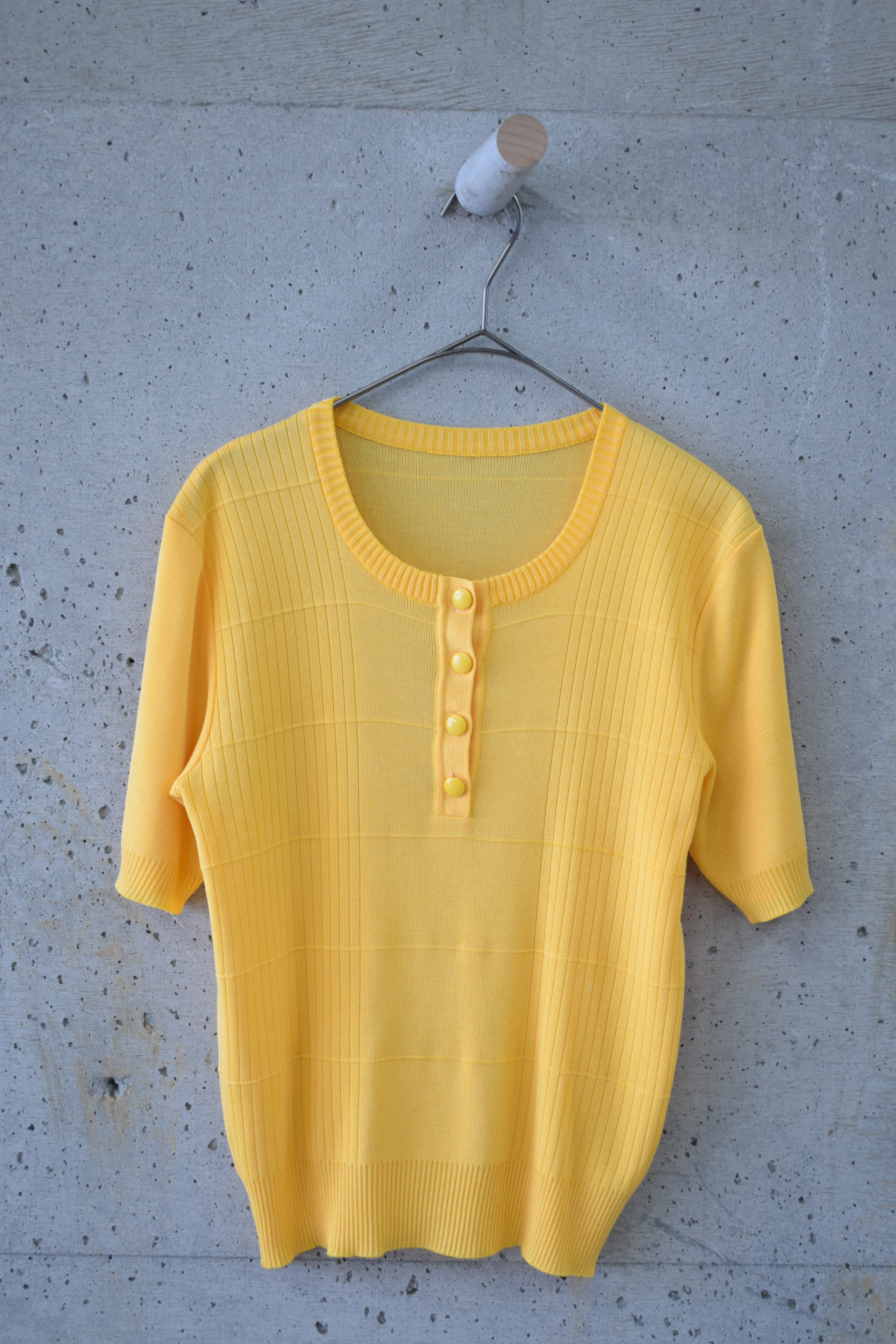 Mango-colored top