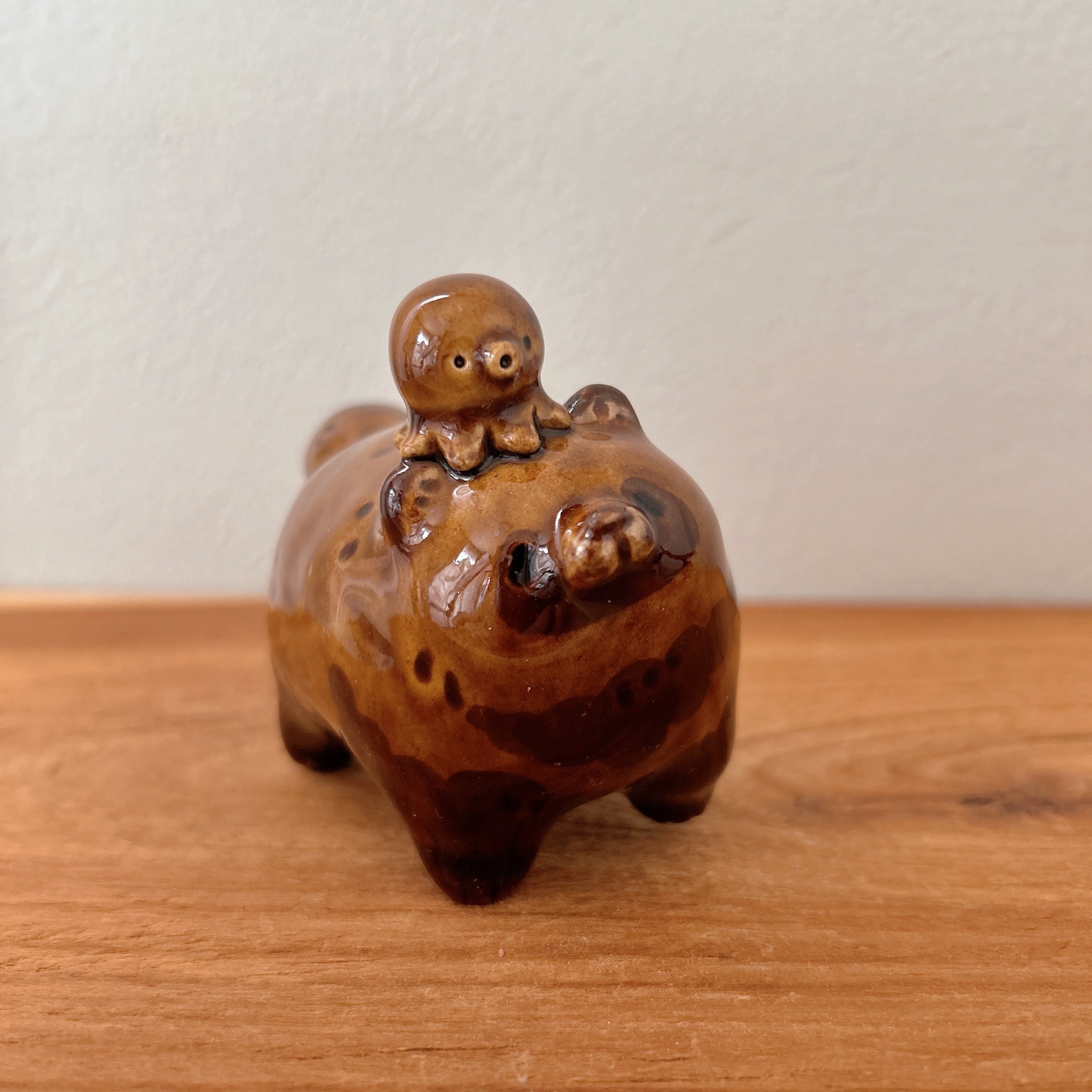 木彫りの熊風たぬき タコさんwinner | BlueBell