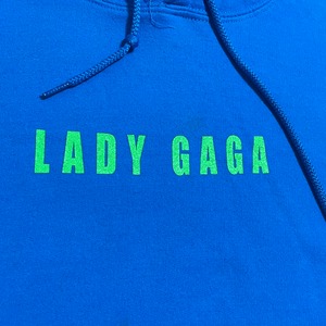 【Lady Gaga】Enigma オフィシャル 公式 バックプリント ロゴ プリント スウェット パーカー フーディー プルオーバー XL ビッグシルエット プリントタグ 蛍光色 エニグマ レディー・ガガ US古着
