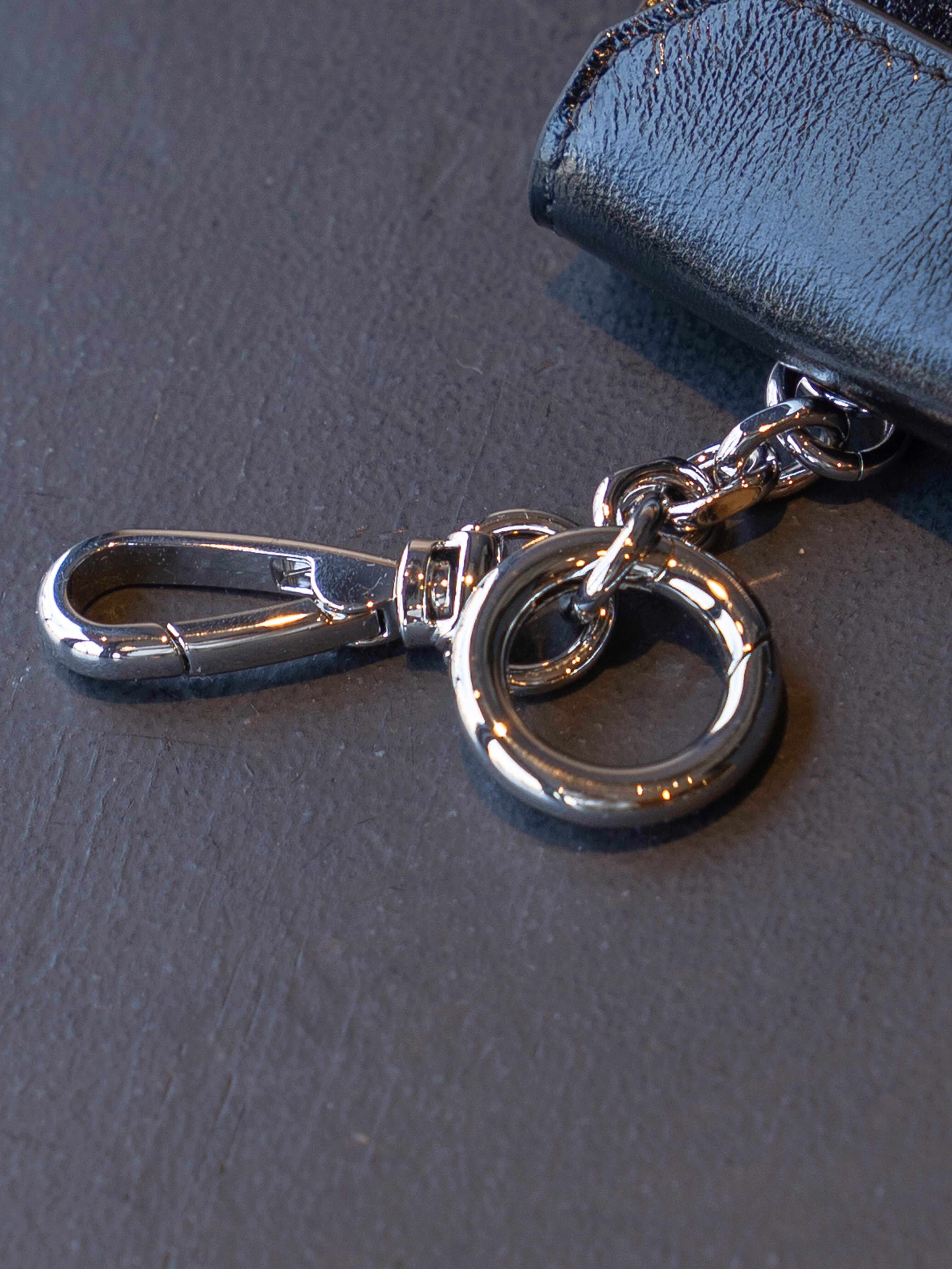 MAISON MARGIELA 4 STITCH LEATHER TEA BAG CHARM Black