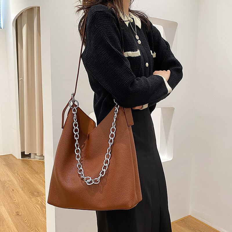 スタンダードレザーオータムウィンターチェーン レトロ 秋物 冬物 メッセンジャーバッグ Tiancai_Wing_Bag6214052108