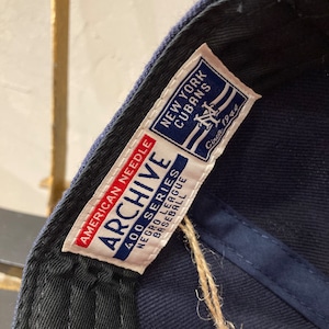 AMERICAN NEEDLE ARCHIVE LEGEND FLAT VISOR CAP