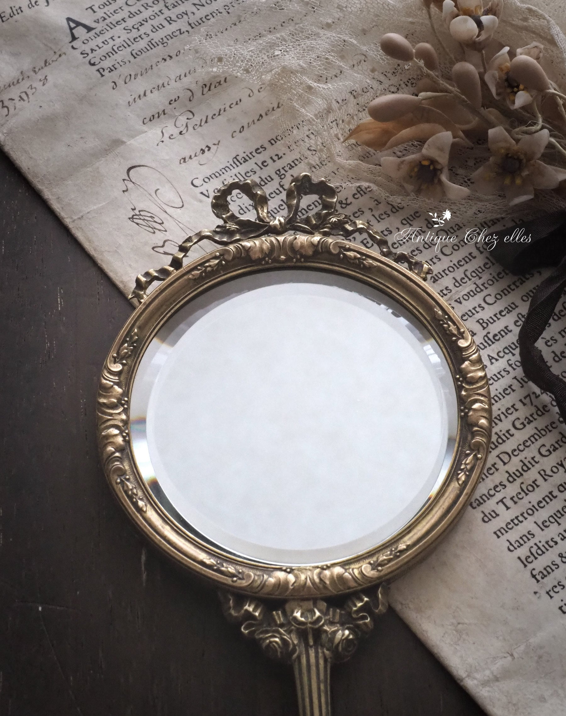リボンのオルモル装飾の鏡-