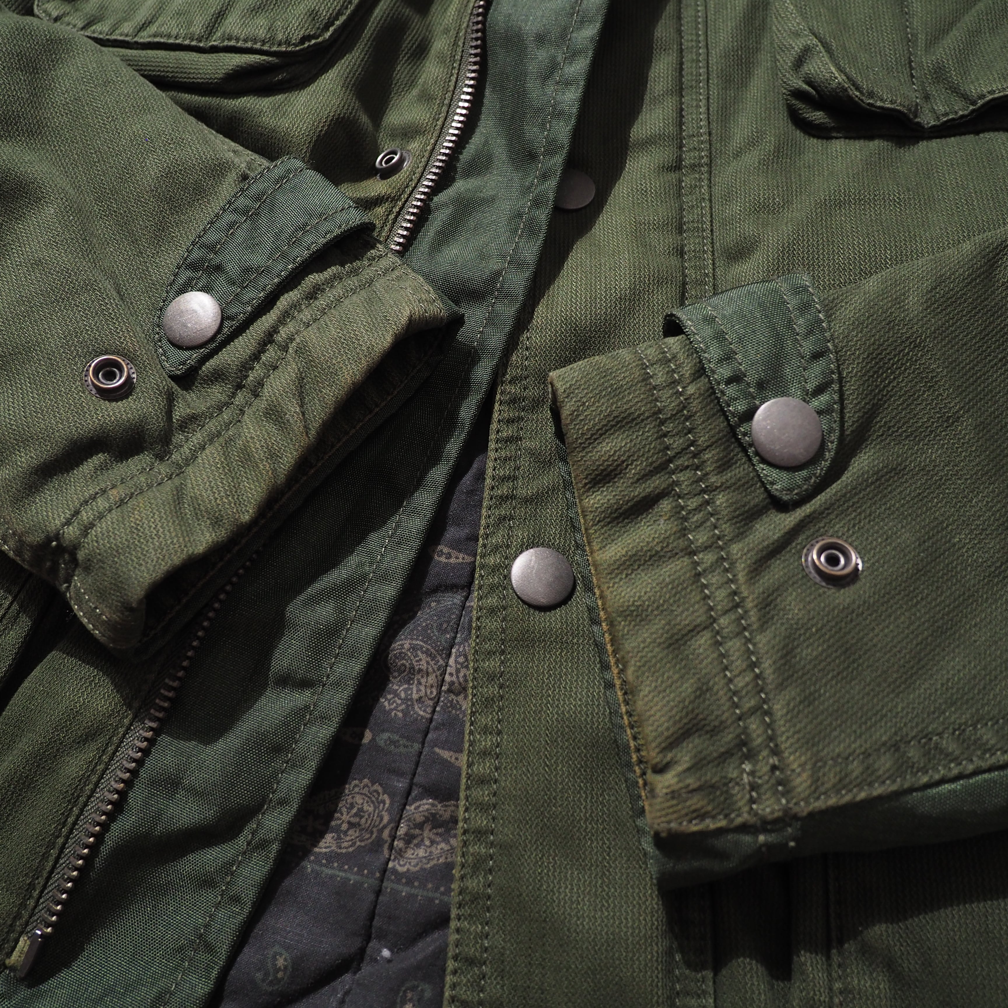 " DIESEL " Big Pockets × Switching nylon High neck Military jacket