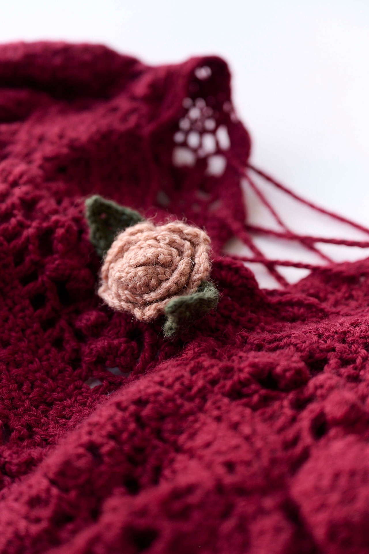 Crochet rose sweater