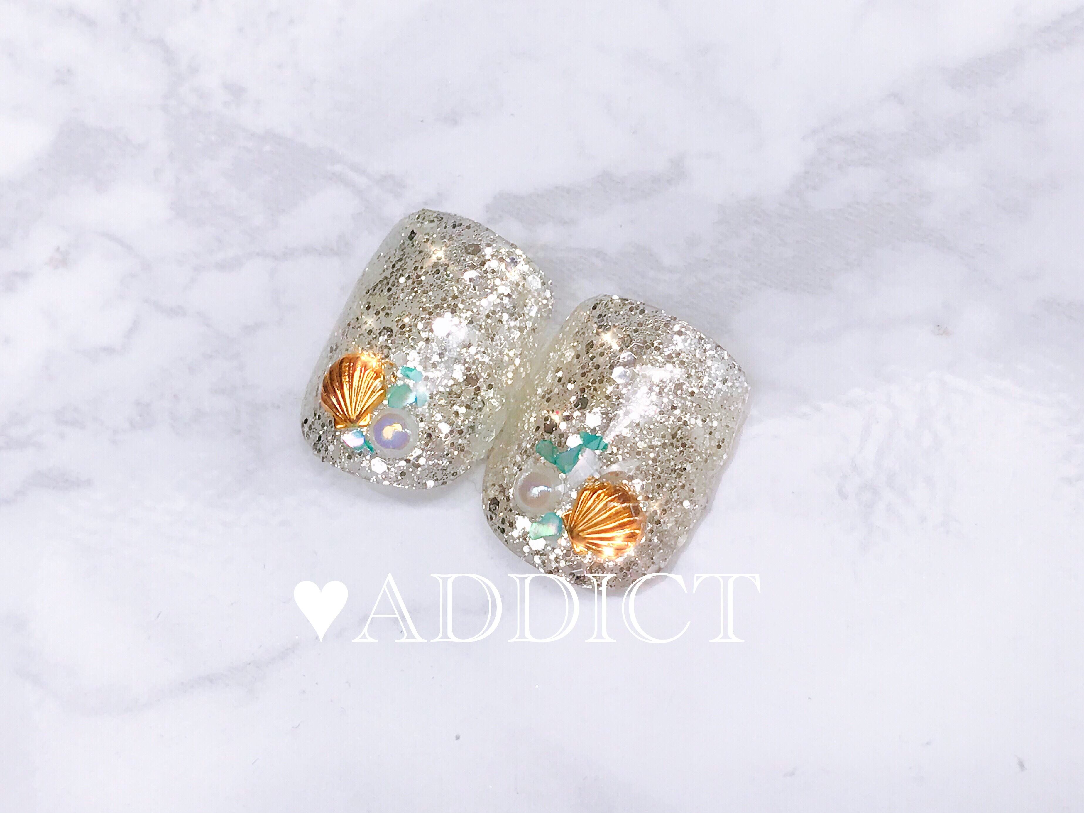 親指ペディキュアフットネイルチップ シンプルラメワンカラー夏貝殻シェルシルバー Addict