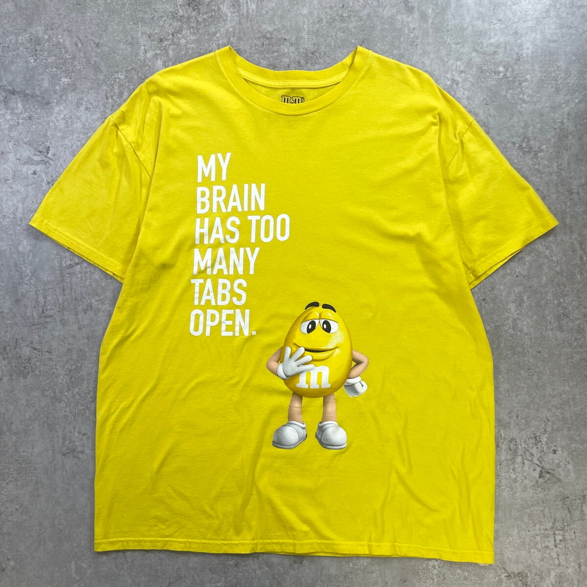 エムアンドエムズ キャラクターＴシャツ サイズ表記 M イエロー m&m's マース YELLOW チョコレート DELTA デルタ 半袖 character プリント キャラT 古着【中古】WV2504-R0249 m&m's エムアンドエムズ キャラクタープリントTシャツ メンズXL 古着