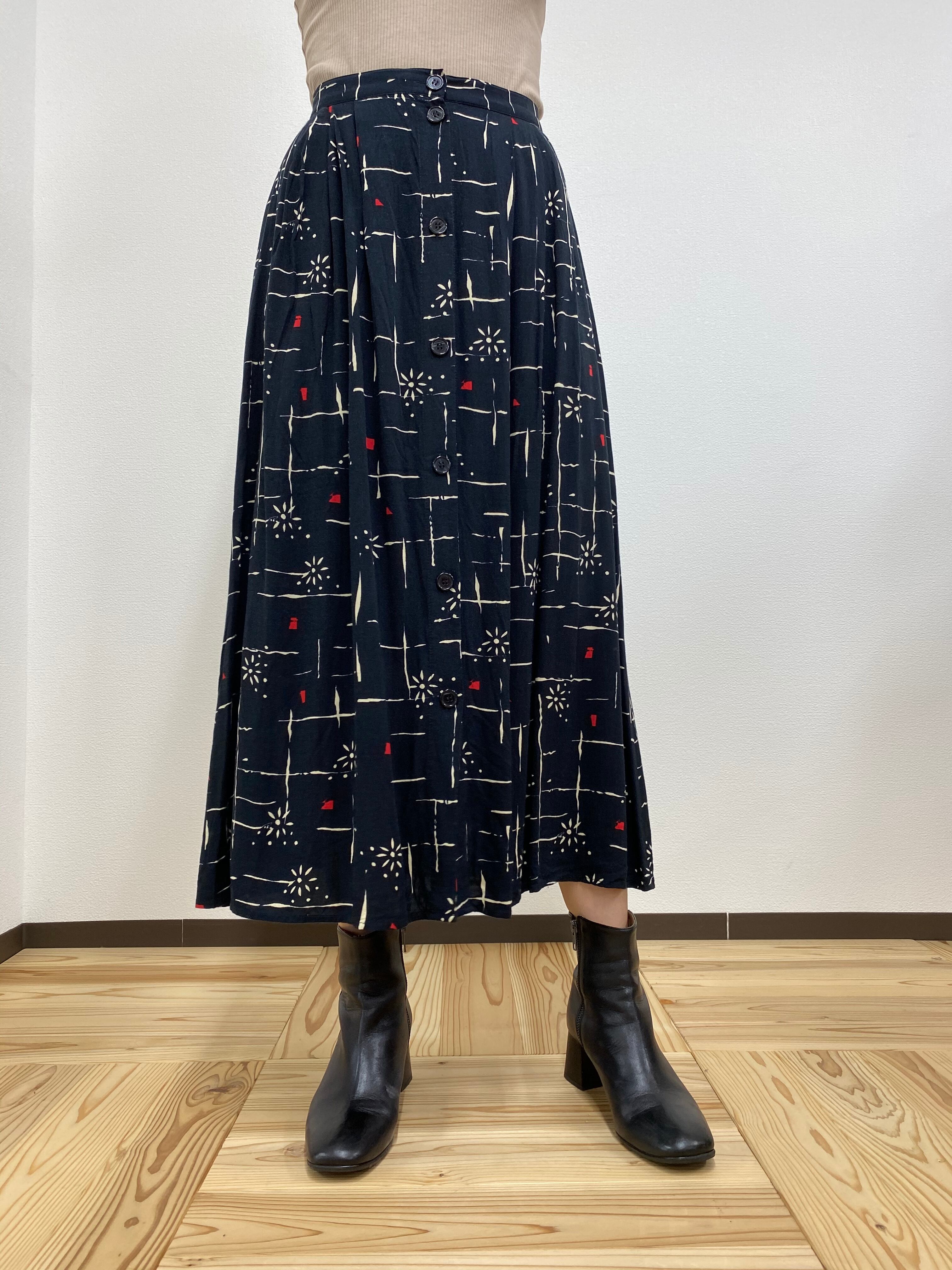 monotone flower check tuck skirt