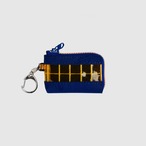 vibram coin pouch keychain (navy×orange) with orange glowing zip
