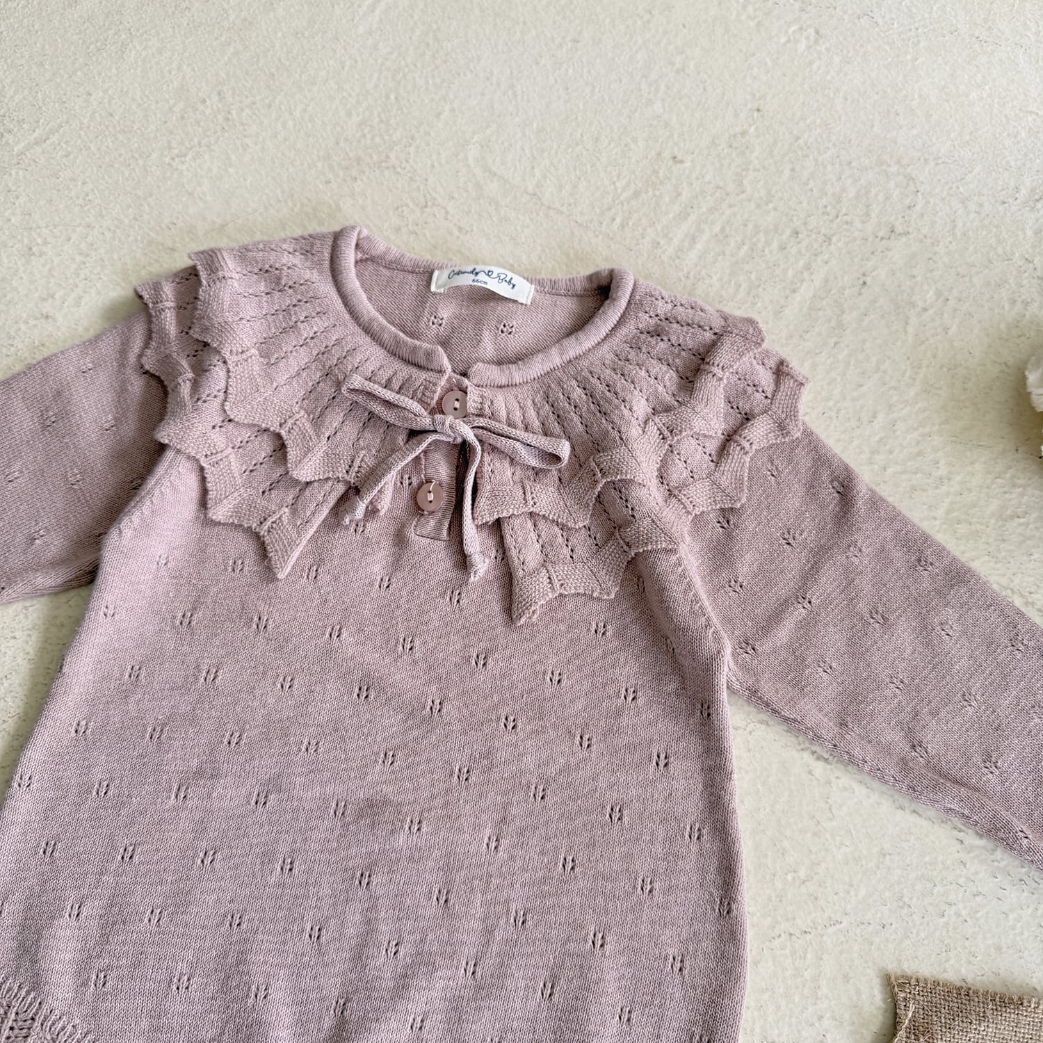 透かし編みニットロンパース