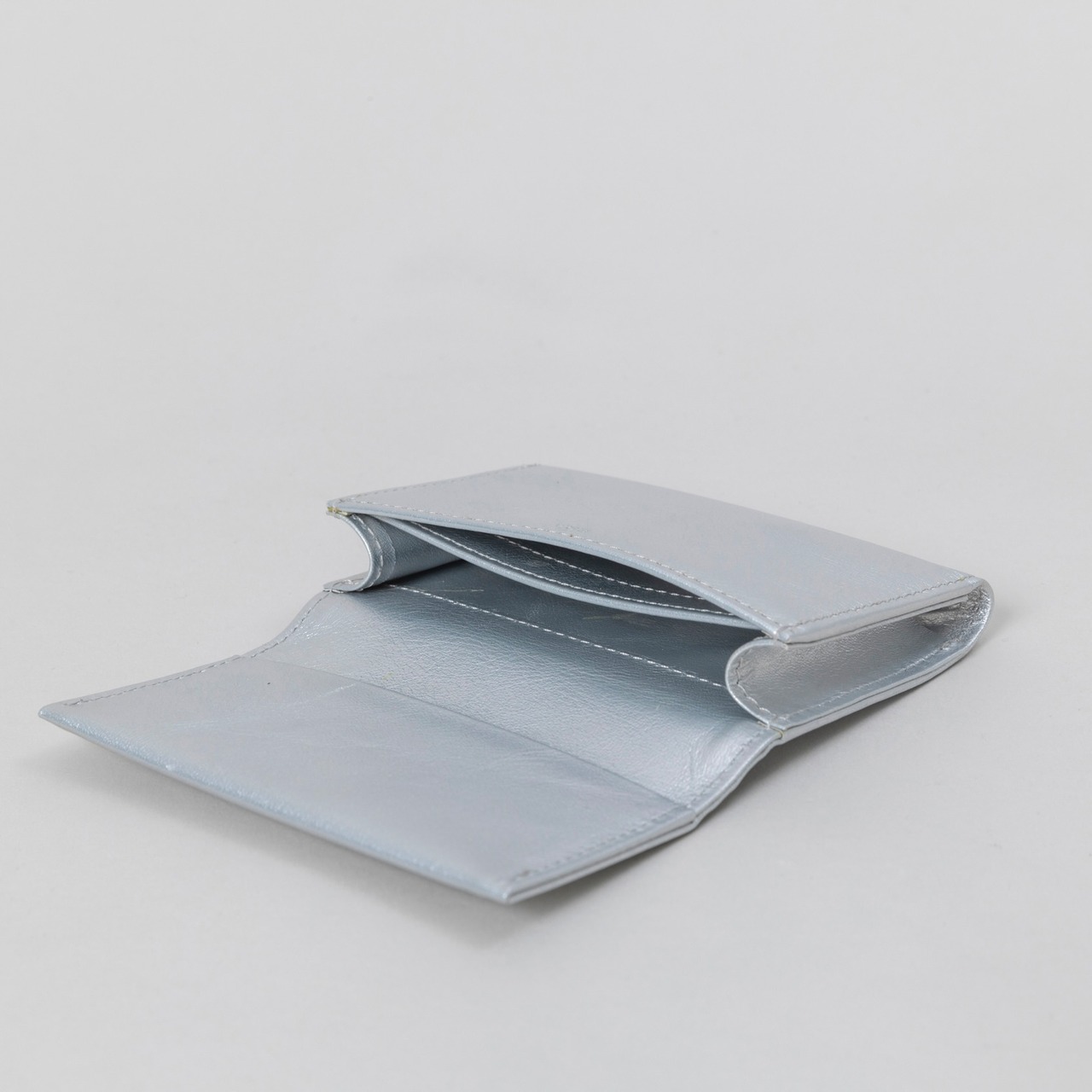 E R A. SPRKNG BUSINESS CARD CASE