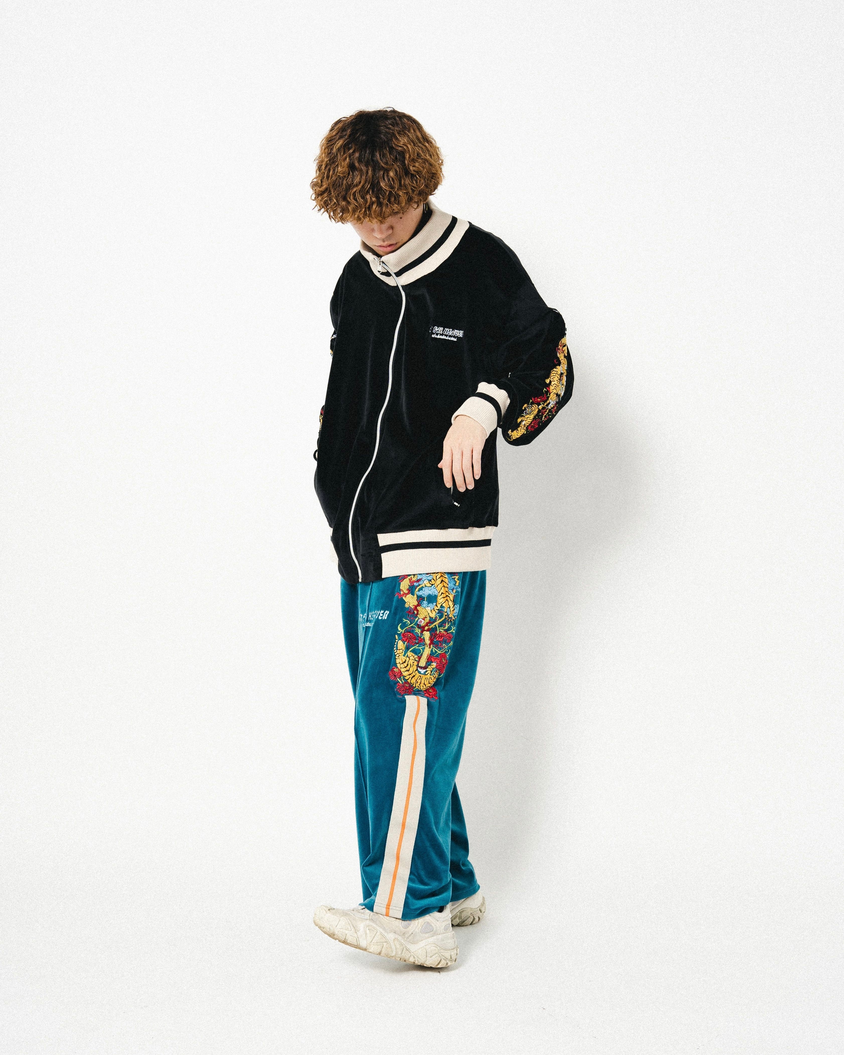 Tiger track pants | チュウカタベタイ