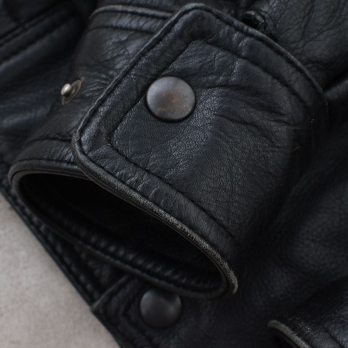 ジャケット・アウター deformation leather jacket oops clothing OY/オーワイ』EMBOSSED CROSS FAUX LEATHER HOODED JACKET/エンボス