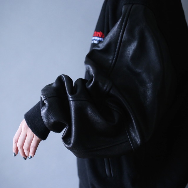 "wool × leather" switching design back embroidery over silhouette stadium blouson