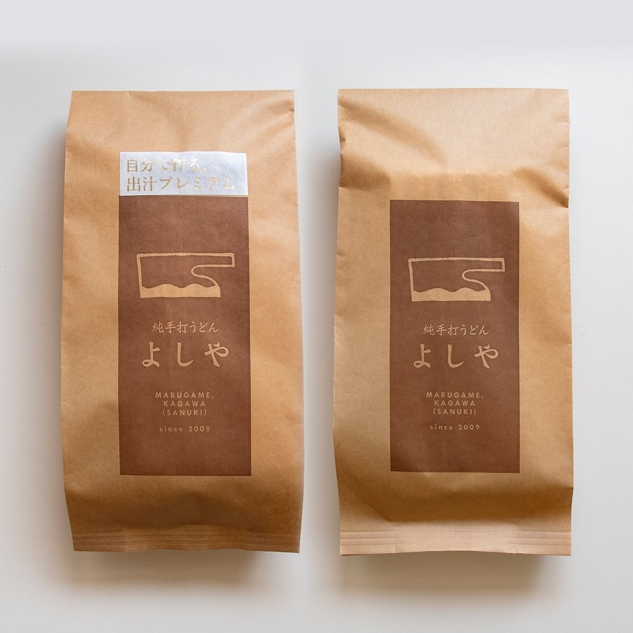 出汁プレミアム+醤油うどんセットを1つずつ。 | 純手打うどん よしや