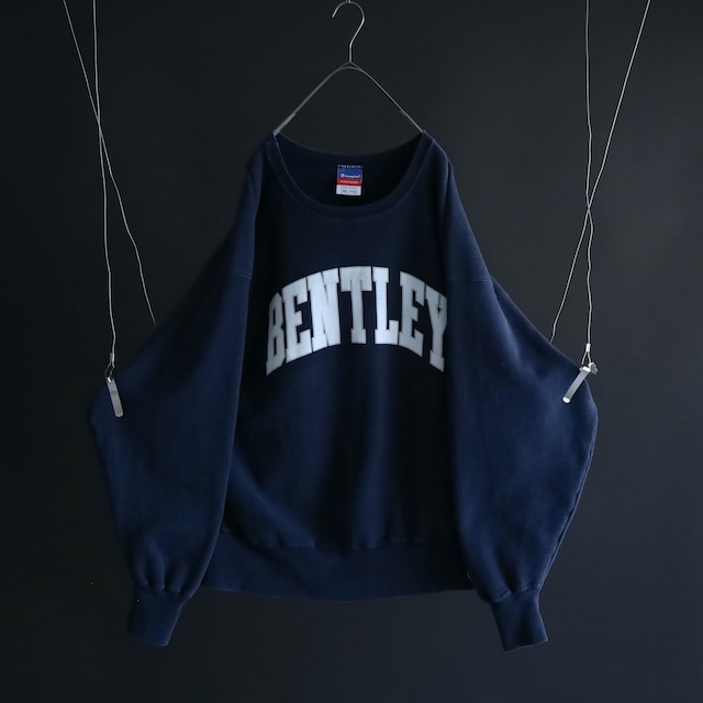 " Champion " over silhouette rubber print design navy color reverse weave sweat pullover