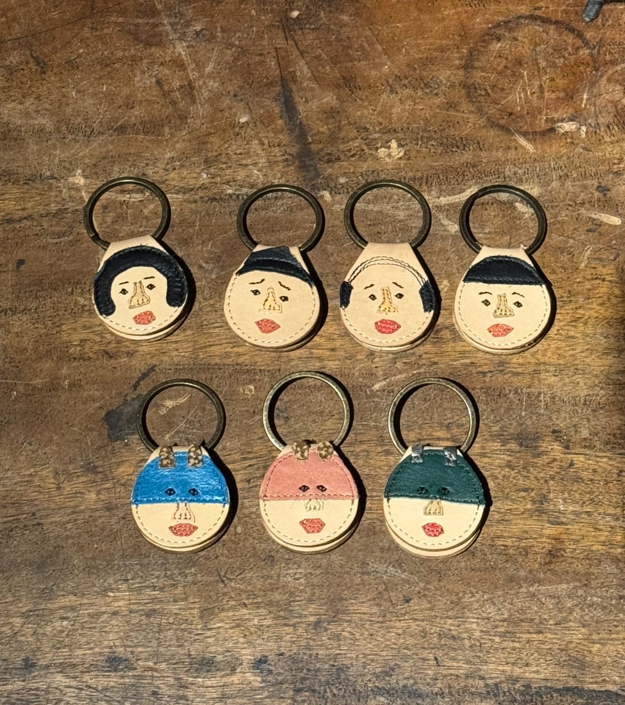 雨ザラシ工房 本革くりのがま口 紐付き | teshigotoya ねむの木の豆