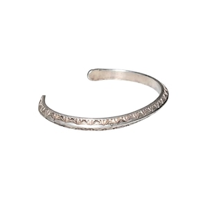 Darell Cadman silver stamped bangle