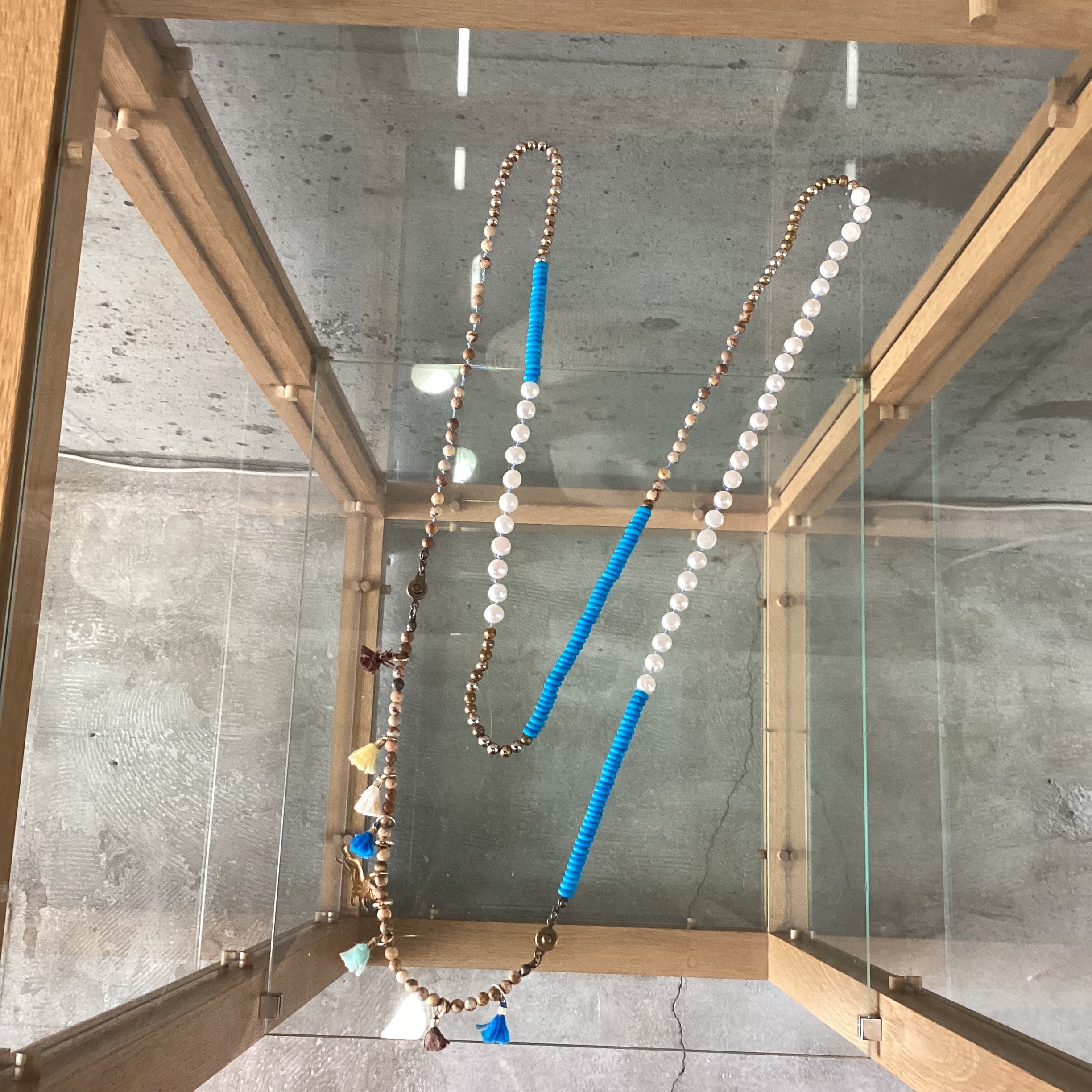 Mixed material long necklace