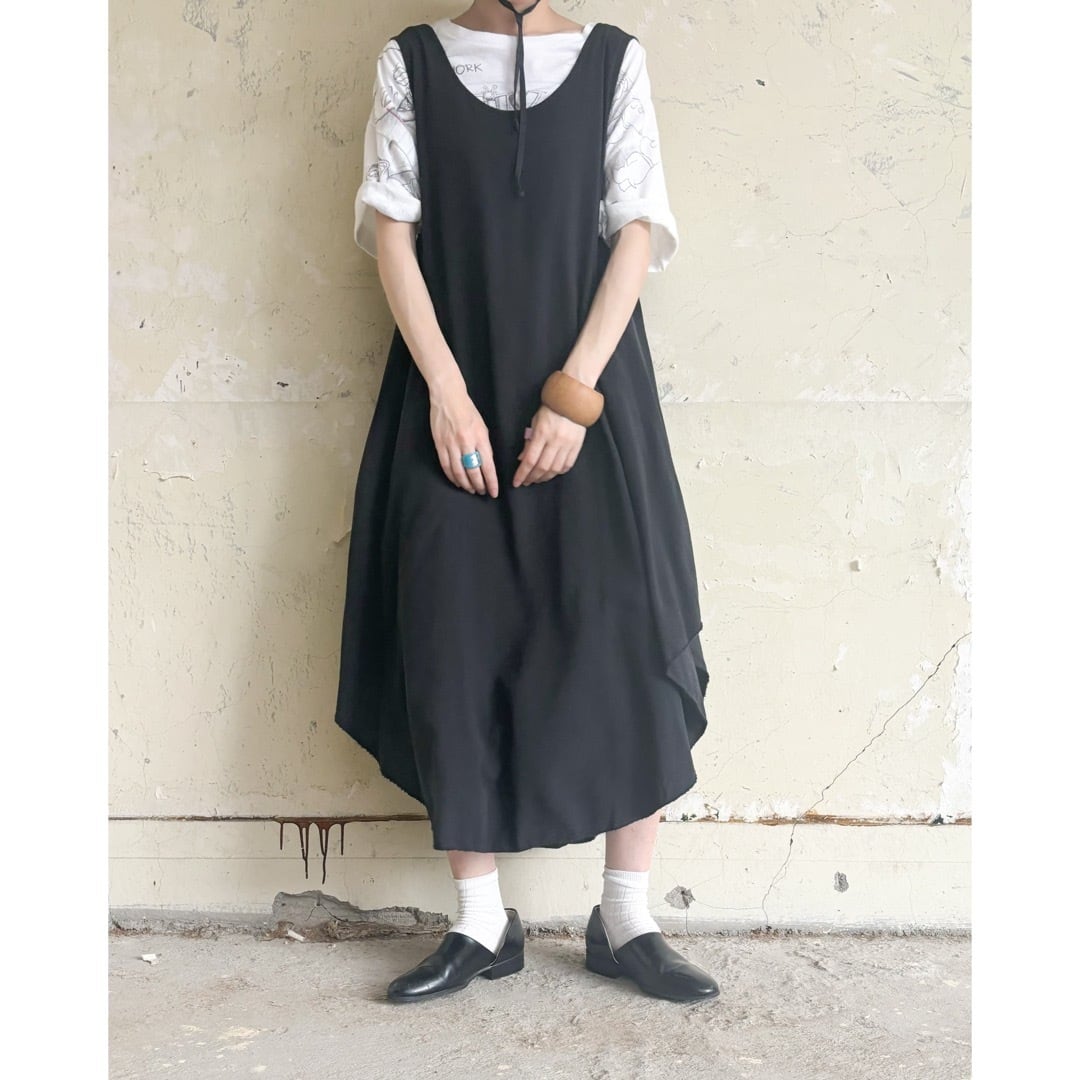 black asymmetric one-piece | en