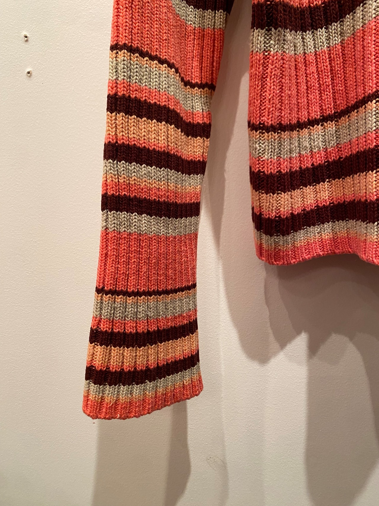 Border design turtleneck knit top