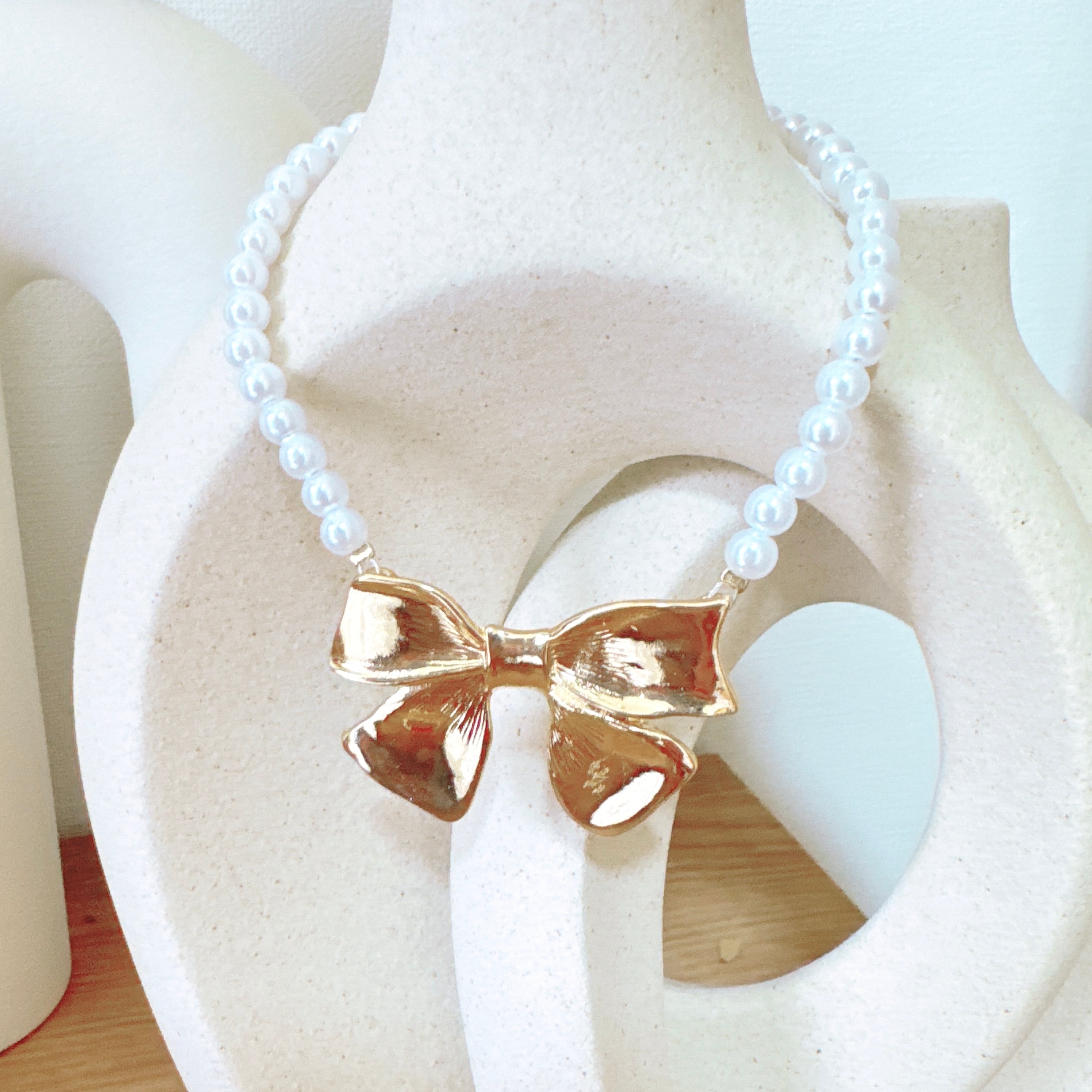 大きなゴールドリボンネックレス