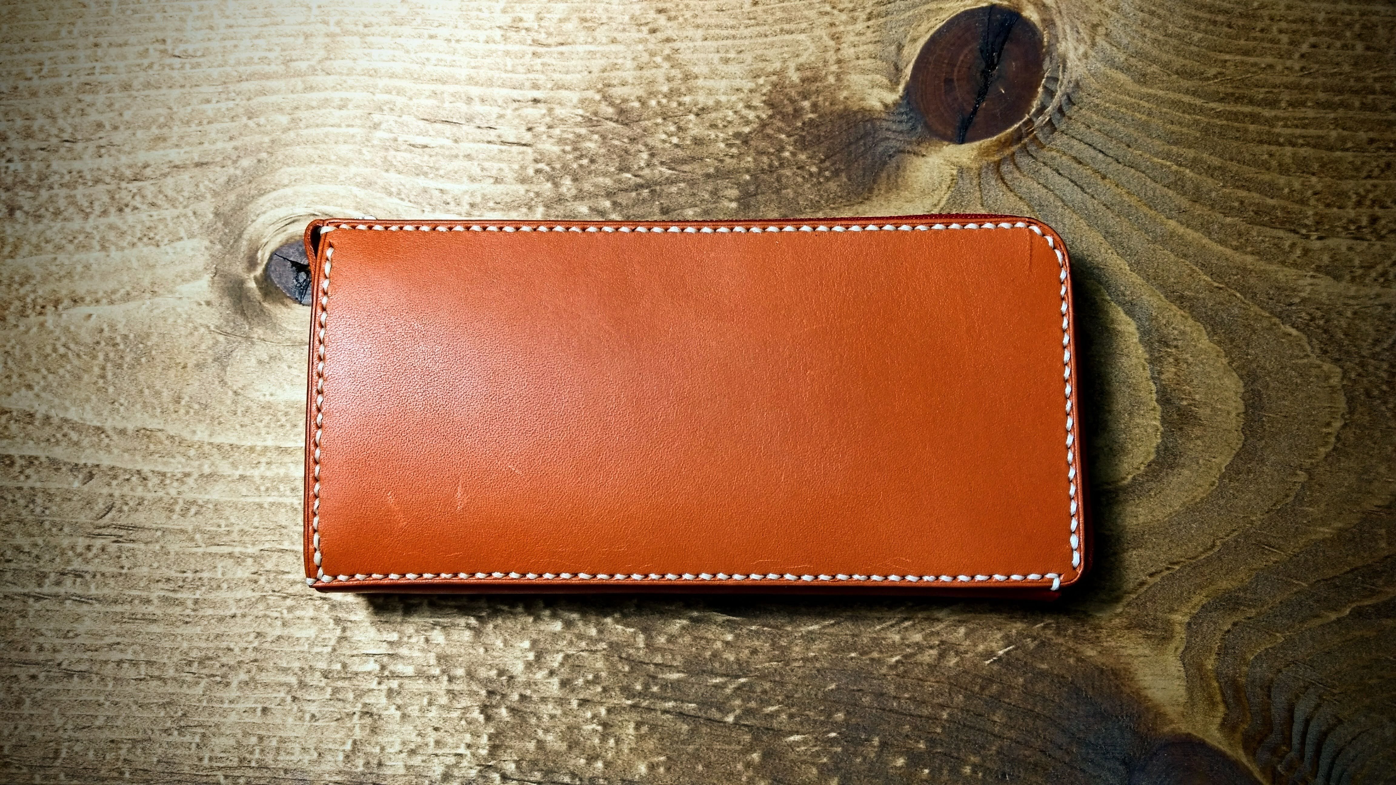 L字ファスナー型長財布 牛本革「ロマーネ革」使用 橙×赤 手縫い財布
