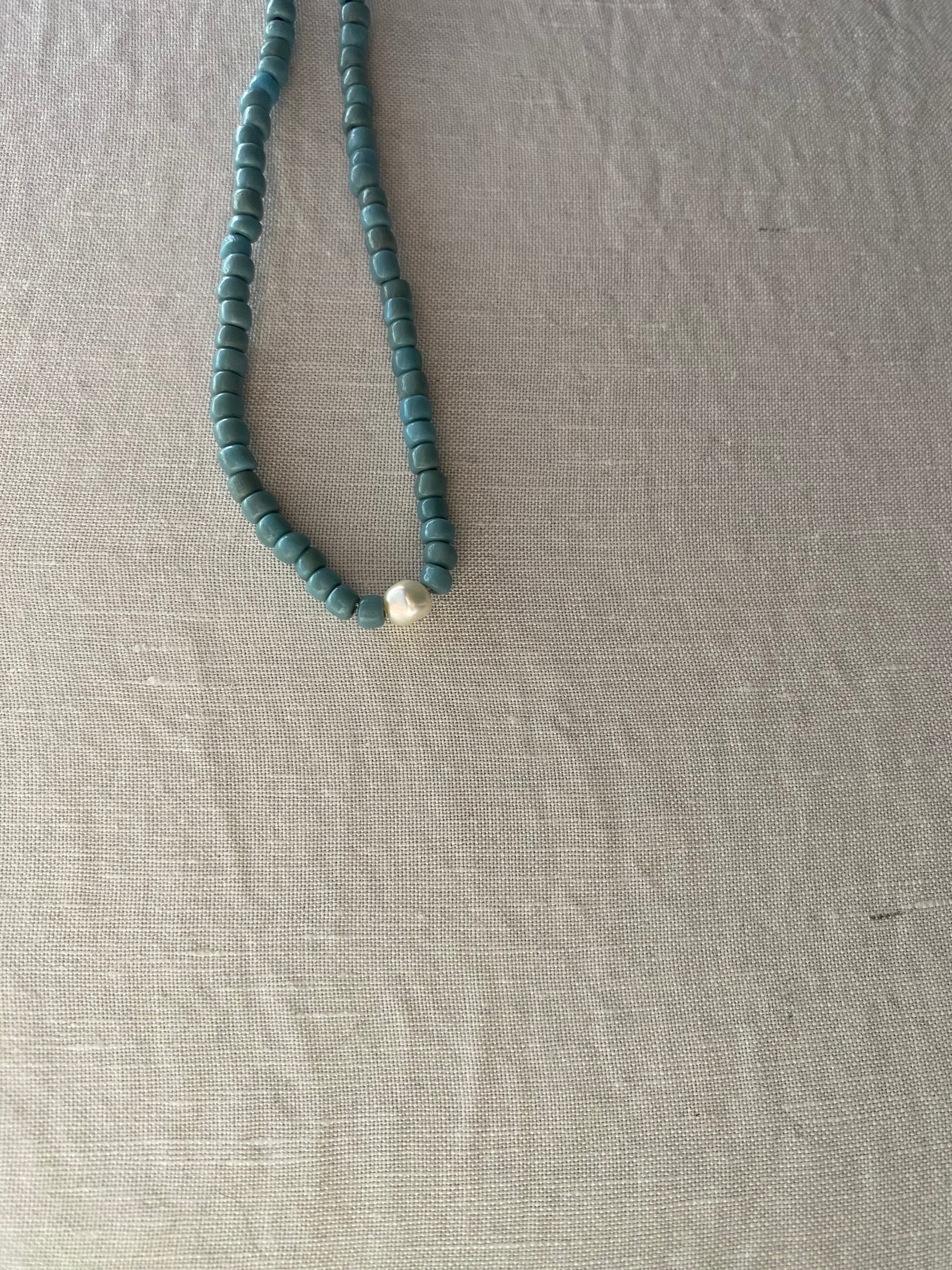 teal pebble-glass necklace