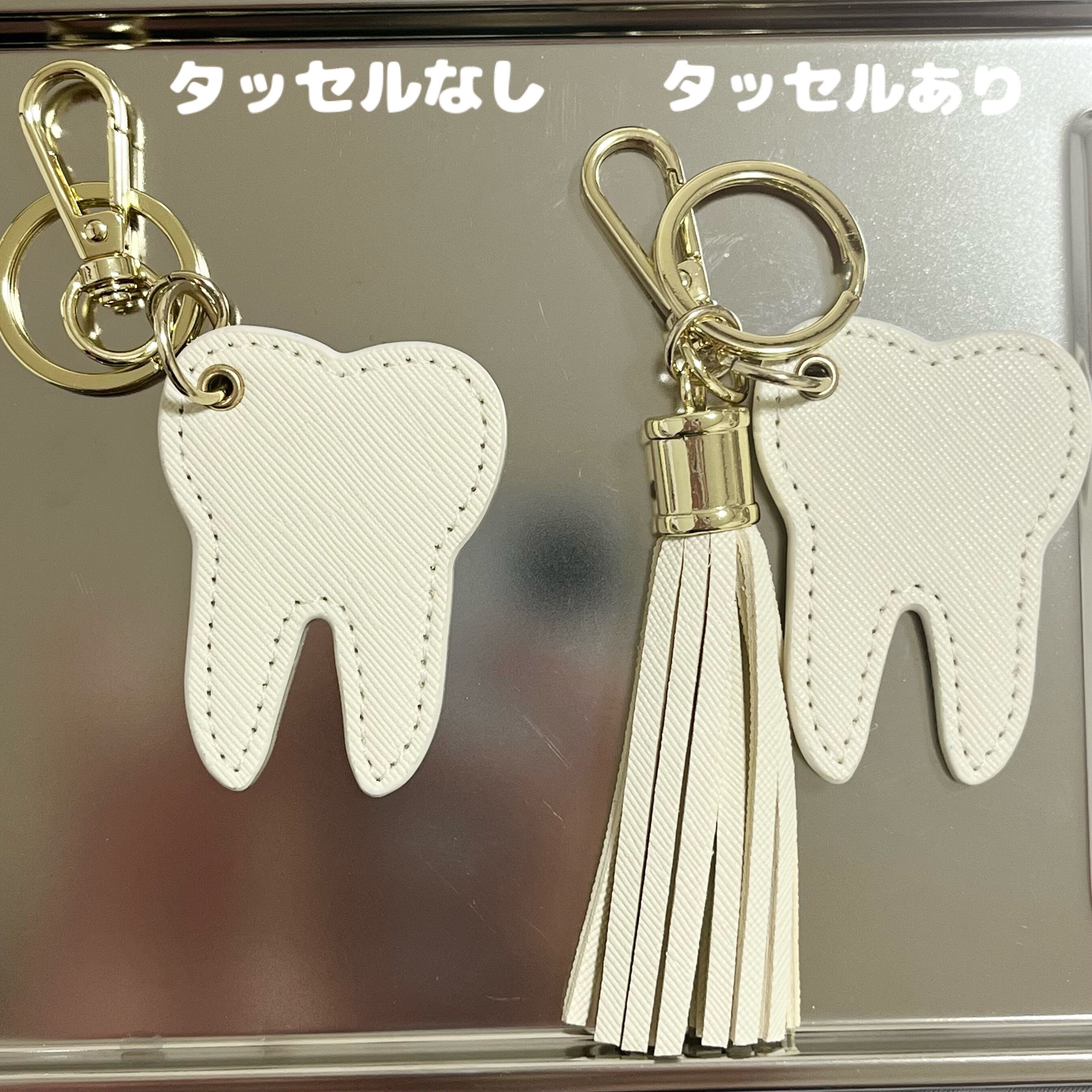 歯のレザー風キーホルダー(ピンク) | わだラボ
