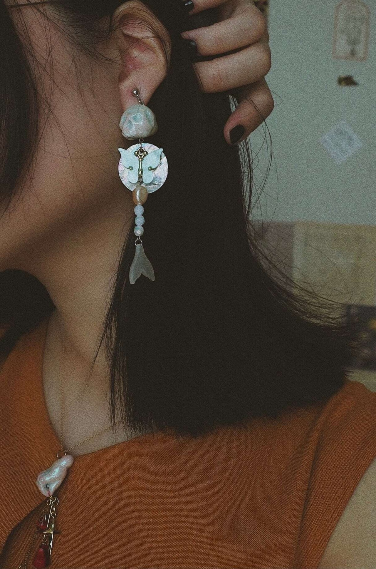 Mermaid remains and butterfly