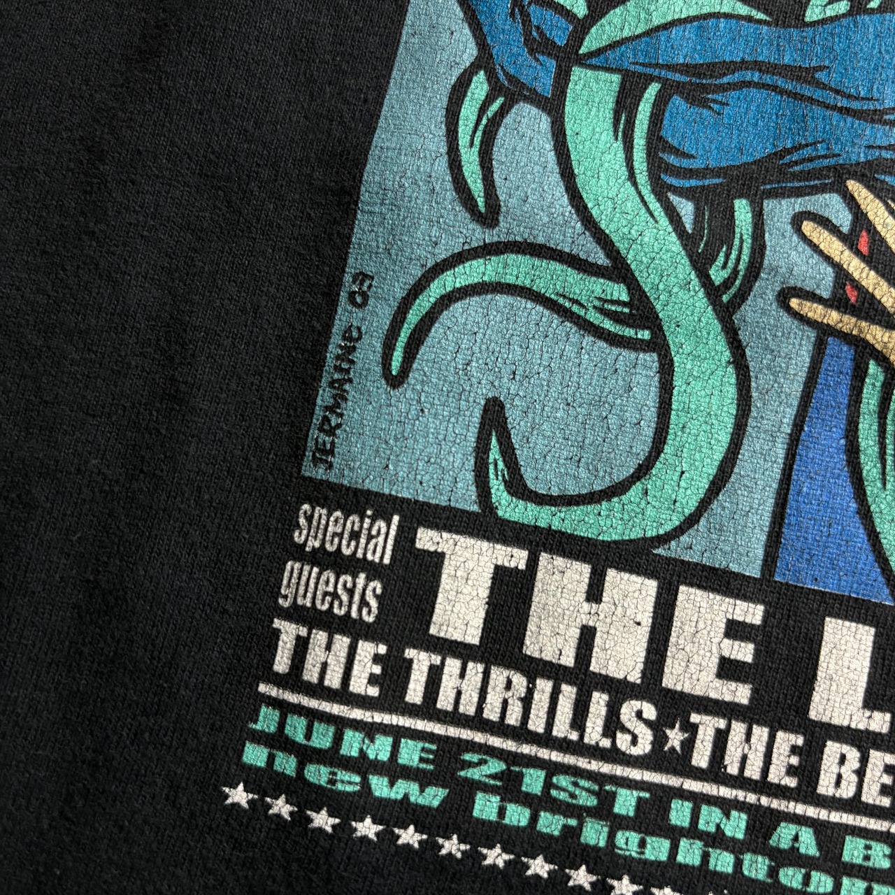vintage 2003’s one day festival tee artwork by Jermaine Rogers